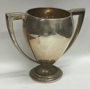 An Edwardian silver two handled trophy cup of balu