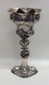 An unusual Dutch silver swirl decorated vase with