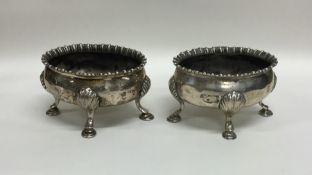 A pair of Georgian silver salts of oval form. Appr