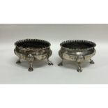 A pair of Georgian silver salts of oval form. Appr