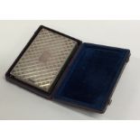 A good quality engine turned silver notepad with i