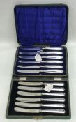 Two cased sets of silver handled tea knives. Est.