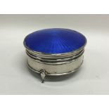 A silver and enamel top jewellery box with hinged