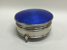 A silver and enamel top jewellery box with hinged