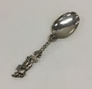 A Continental silver spoon decorated with a warrio