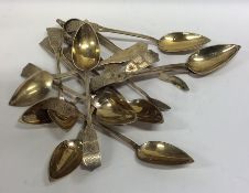 A set of twelve silver gilt Russian teaspoons engr