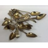 A set of twelve silver gilt Russian teaspoons engr