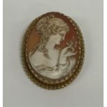 A high carat gold mounted cameo depicting a lady's