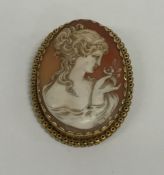 A high carat gold mounted cameo depicting a lady's