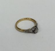 An Edwardian 18 carat gold and diamond mounted sin