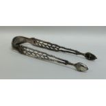 A pair of attractive Georgian silver sugar tongs w