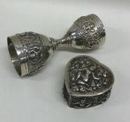 An Indian heart shaped trinket box together with a
