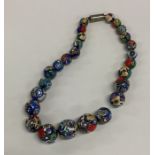 A Venetian glass mounted graduated ball necklace.