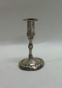 An Antique silver chamber stick with ball decorati