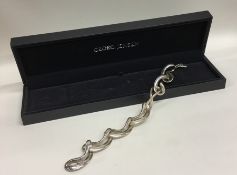 GEORG JENSEN: An unusual silver bracelet of curb l