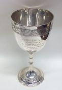 A Victorian silver goblet with acorn decoration. B