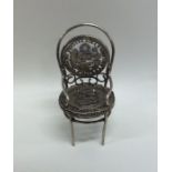 An unusual miniature silver dolls' house chair dec