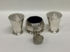 A small silver three piece cruet together with a t