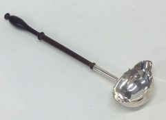 A good Georgian silver toddy ladle with pouring li