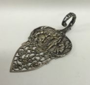 An embossed silver Continental slice decorated wit