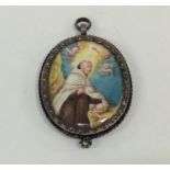 An 18th Century oval religious pendant in silver f
