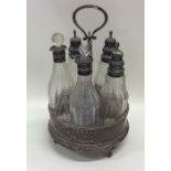 A Georgian silver five bottle cruet. London. Appro