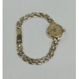 A lady's 9 carat wristwatch. Approx. 14.4 grams. E