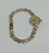 A lady's 9 carat wristwatch. Approx. 14.4 grams. E