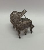 A novelty silver dolls' house grand piano with fil