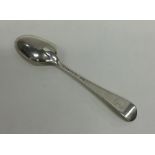 A Georgian silver Hanoverian pattern spoon with cr