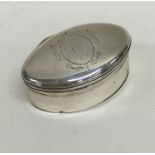 A Georgian silver oval nutmeg grater with hinged t