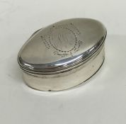 A Georgian silver oval nutmeg grater with hinged t