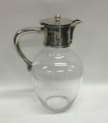 A good Victorian silver mounted hinged top water j