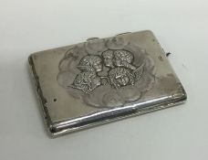 A silver hinged top purse decorated with cherubs.