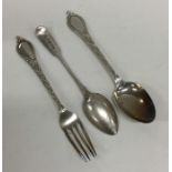 An unusual silver christening set together with a