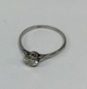 An attractive platinum single stone diamond ring i