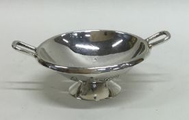 A novelty silver miniature colander on pedestal fo