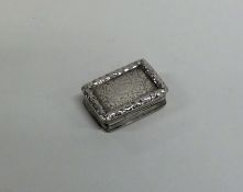 A Georgian silver vinaigrette with cast border wit