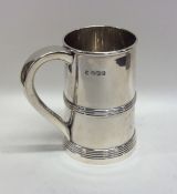 A heavy Edwardian silver tapering christening cup