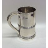 A heavy Edwardian silver tapering christening cup