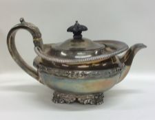 A good Georgian silver circular teapot with gadroo
