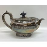 A good Georgian silver circular teapot with gadroo