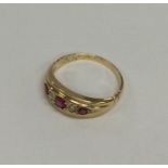 A ruby and diamond ring in gold mount. Approx. 3.1