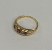 A ruby and diamond ring in gold mount. Approx. 3.1