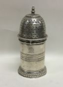 A Victorian silver lighthouse caster with reeded b