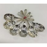 A set of six Edwardian silver spoons with panelled