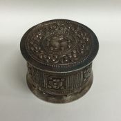 A circular Antique silver Eastern box decorated wi