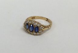 A good Victorian sapphire and diamond cluster ring