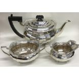 An attractive Edwardian silver three piece tea ser