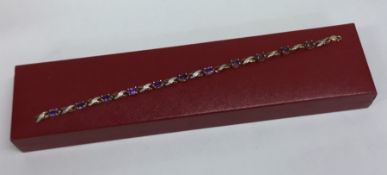 An amethyst mounted bracelet with ring clasp. Appr